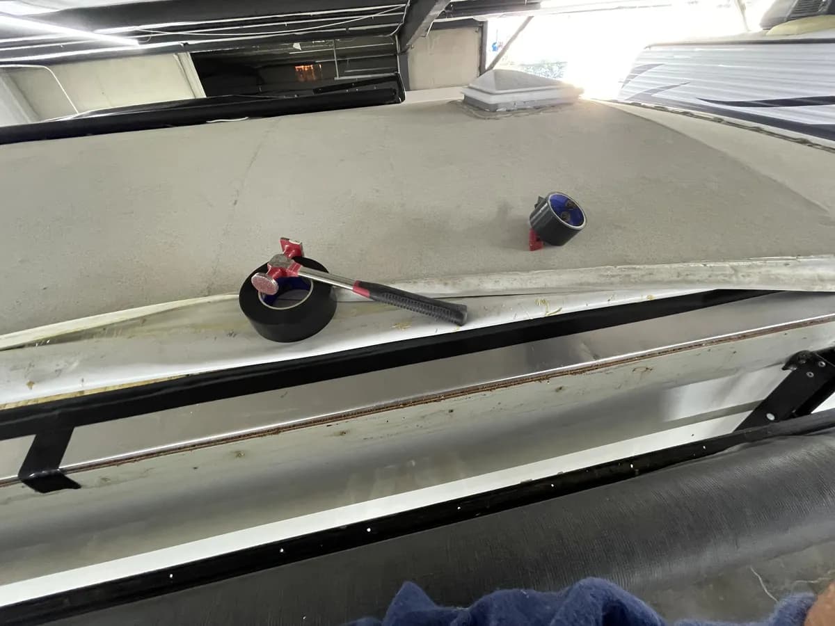 Radiance camper roof edge after repair with new trim and weatherproofing